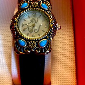 Woman’s Turquoise and leather watch